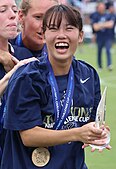Matsukubo with the Challenge Cup trophy