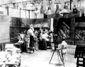 Image 25A.E. Smith filming The Bargain Fiend in the Vitagraph Studios in 1907. Arc floodlights hang overhead. (from History of film)