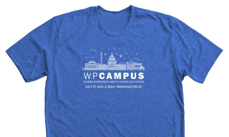 The blue version of the WPCampus 2025 shirt, which has the event name, location, and a illustration of the Washington DC skyline.